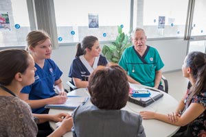 Multidisciplinary team in a meeting. 